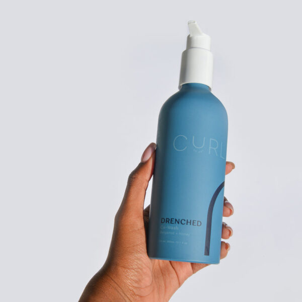 Drenched co-wash serves as a conditioning cleanser for your strands.